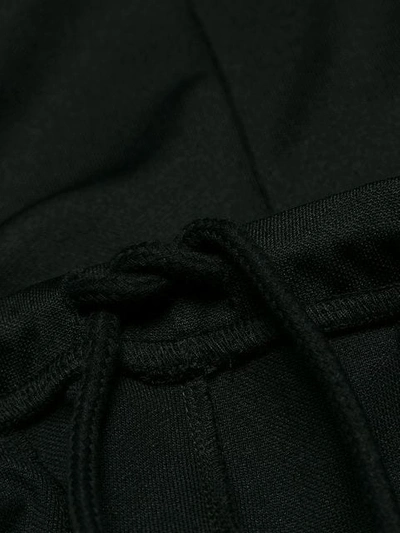 Shop Maison Margiela Side-stripe Fitted Trousers In Black