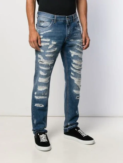 Shop Dolce & Gabbana Ripped Straight Leg Jeans In Blue
