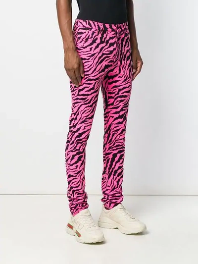 Shop Gucci Animal Print Jeans In Pink