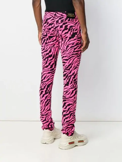 Shop Gucci Animal Print Jeans In Pink