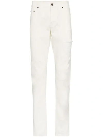 Shop Saint Laurent Straight Cut Distressed Jeans In White