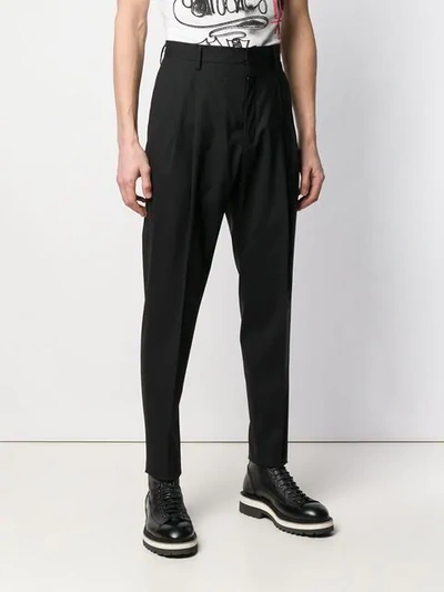 Shop Dsquared2 Tapered Pleated Trousers In Black