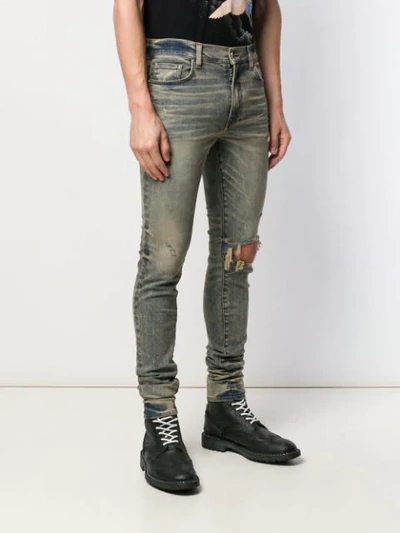 Shop Amiri Skinny Fit Jeans In Dirty Indigo