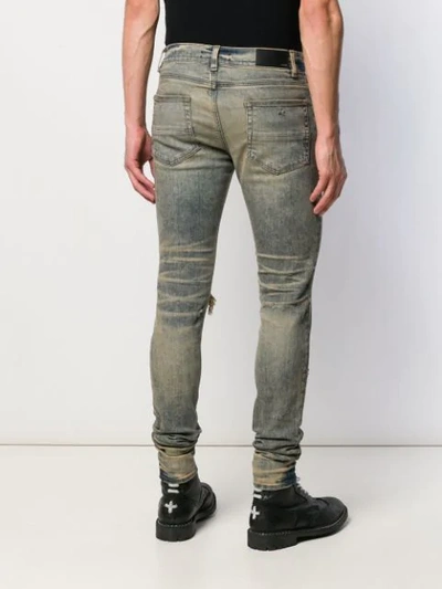 Shop Amiri Skinny Fit Jeans In Dirty Indigo
