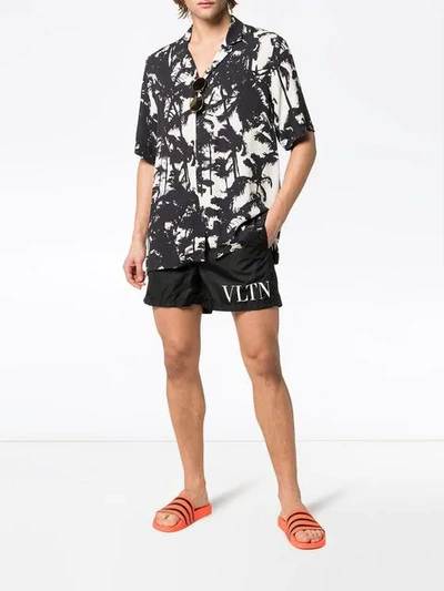 Valentino Logo Printed Beach Shorts In Black
