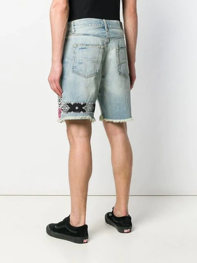 Shop Amiri Distressed Denim Shorts - Blue