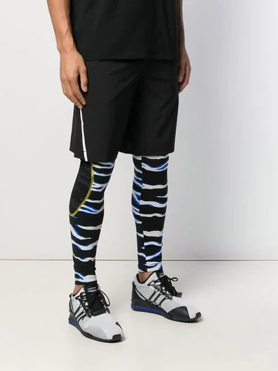 Shop Roberto Cavalli Printed Leggings In Black