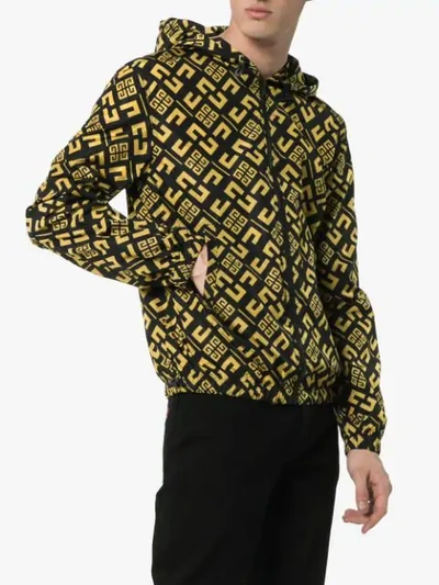 Shop Givenchy Multi Logo Print Hooded Windbreaker Jacket In 770 Black/mustard