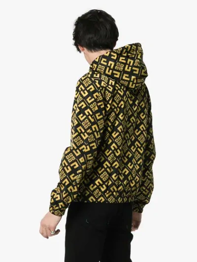 Shop Givenchy Multi Logo Print Hooded Windbreaker Jacket In 770 Black/mustard