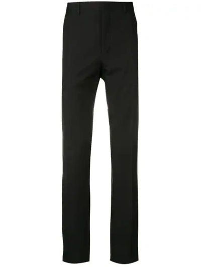 Shop Fendi Side Striped Trousers In Black