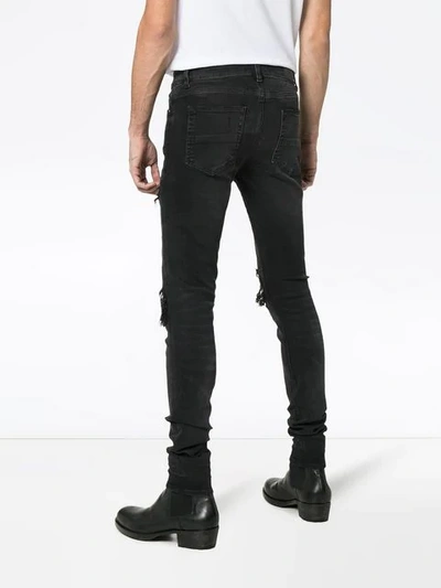 Shop Amiri Mx1 Distressed Bandana Detail Slim Fit Jeans In Black