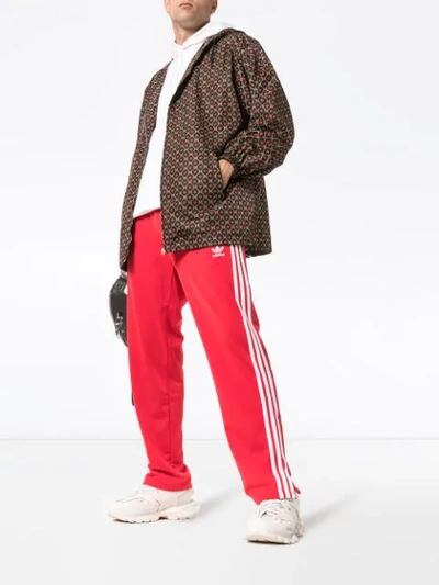 Shop Gucci Gg-print Hooded Windbreaker Jacket In Multicolour