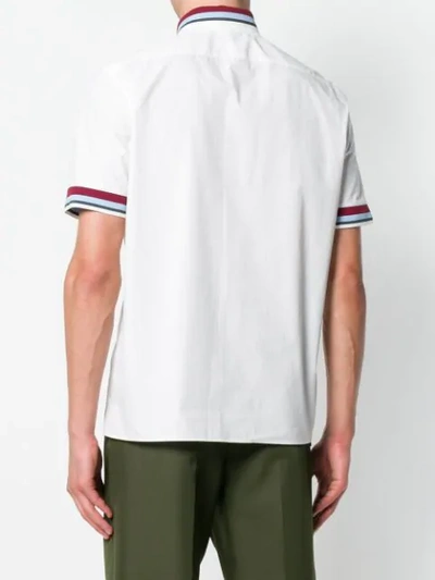 Shop Valentino Striped Trim Polo Shirt In White