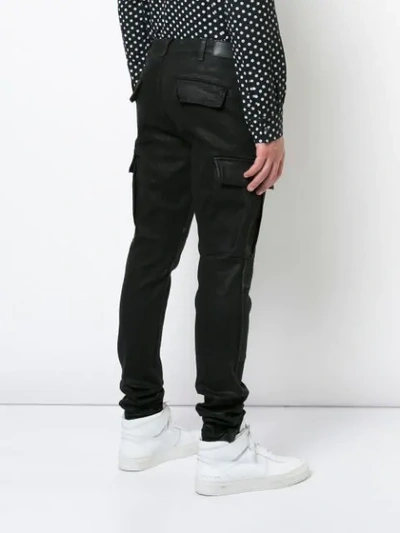 Shop Amiri Skinny Cargo Trousers In Black Wax