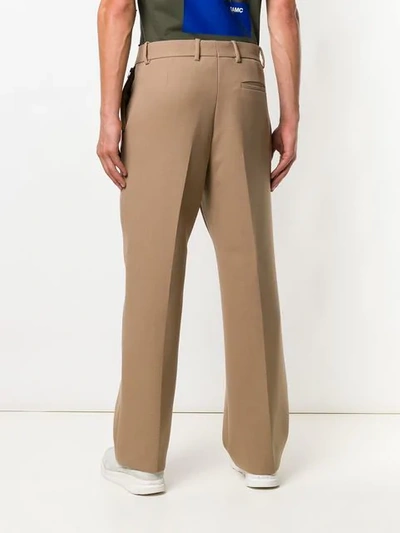 Shop Oamc Wide-leg Pleated Trousers In Neutrals