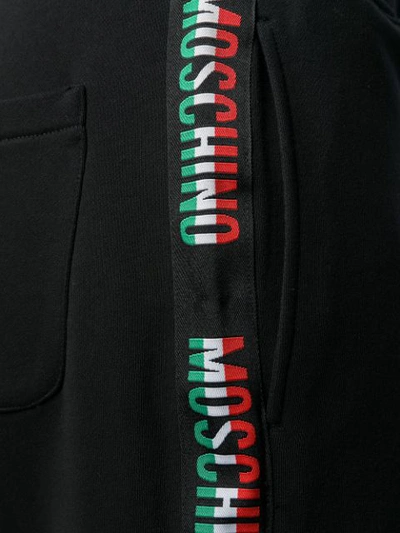 Shop Moschino Logo Stripe Track Shorts - Black