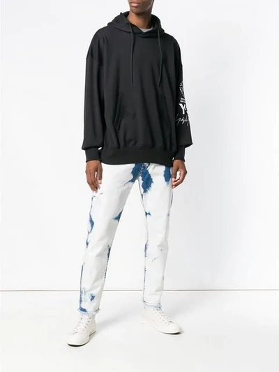 Shop Represent Wash Out Jeans In Blue