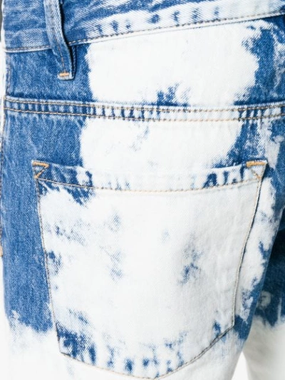 Shop Represent Wash Out Jeans In Blue