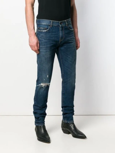 Shop Saint Laurent Distressed Skinny-fit Jeans In Blue