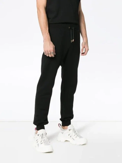 Shop Versace Embroidered Medusa Logo Cotton Sweatpants In A008 Black
