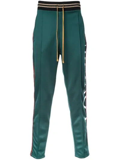 Shop Amiri Relaxed Fit Track Trousers In Green