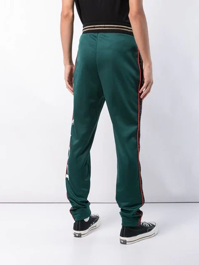 Shop Amiri Relaxed Fit Track Trousers In Green