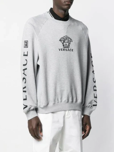 Shop Versace Logo Embroidered Sweatshirt In Grey