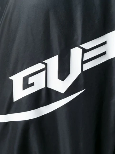 Shop Givenchy Logo Print Shell Jacket In Black