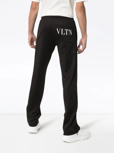 Shop Valentino Vltn Logo Track Pants In Black