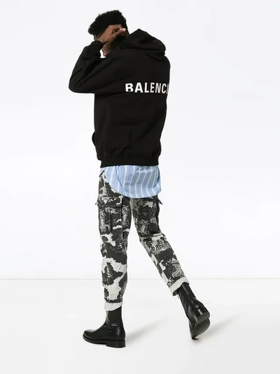 Shop Balenciaga Logo Print Hoodie In Black