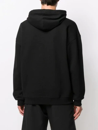 Shop Givenchy Extreme Logo Hoodie In Black