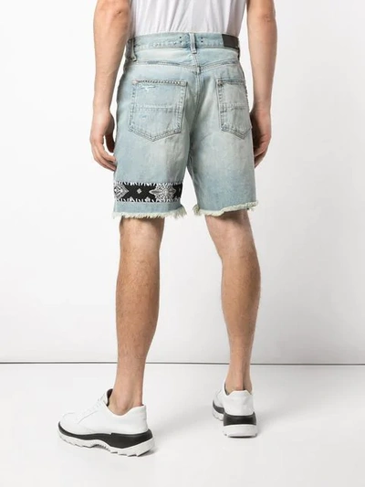 Shop Amiri Distressed Denim Shorts In Indigo