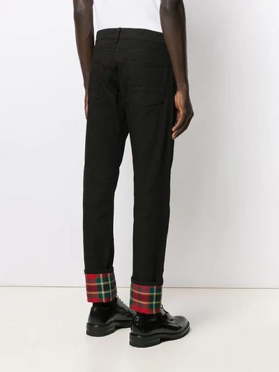 Shop Alexander Mcqueen Tartan Hem Jeans In Black