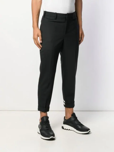 Shop Neil Barrett Striped Cuff Tailored Trousers In Black