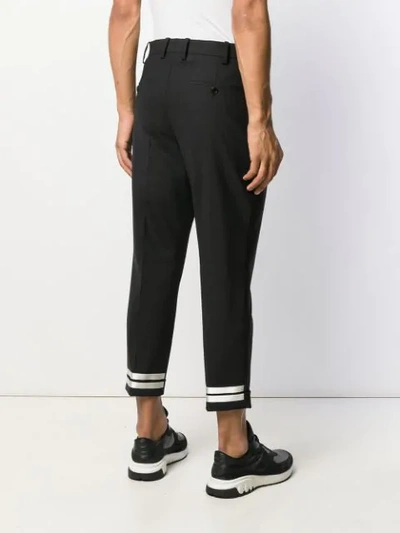 Shop Neil Barrett Striped Cuff Tailored Trousers In Black