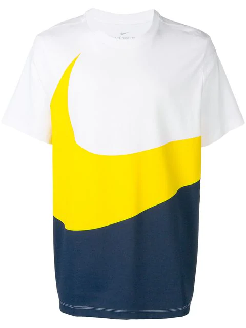 white and yellow nike shirt