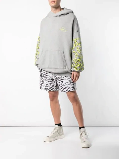 Shop Amiri Tiger Print Shorts In White