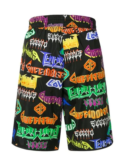 Shop Gucci Metal Logo Printed Swim Shorts In Black