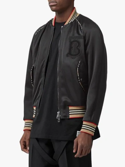 Shop Burberry Icon Stripe Detail Monogram Motif Bomber Jacket In Black