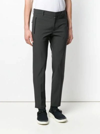 Shop Prada Checked Slim Fit Trousers In Grey