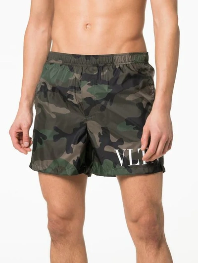 Shop Valentino Vltn Camo Print Swim Shorts In F00 Green Camouflage