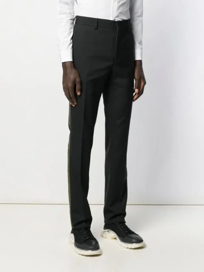 Shop Fendi Logo Stripe Tailored Trousers In Black