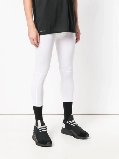 Shop Nike Cropped Fitted Leggings In White