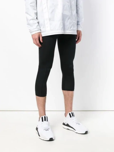 Shop Nike Cropped Elasticated Leggings In Black