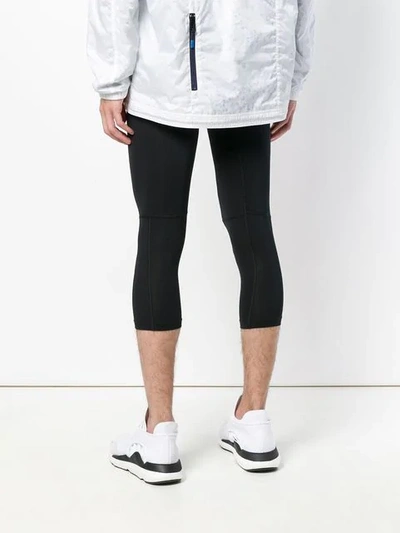 Shop Nike Cropped Elasticated Leggings In Black
