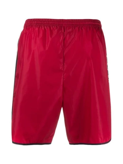 Shop Gucci Interlocking G Swim Shorts - Red
