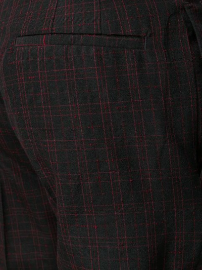 Shop Cmmn Swdn Plaid Trousers In Black