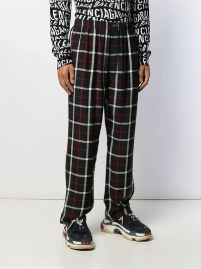 Shop Balenciaga Pajama Style Trousers In Black