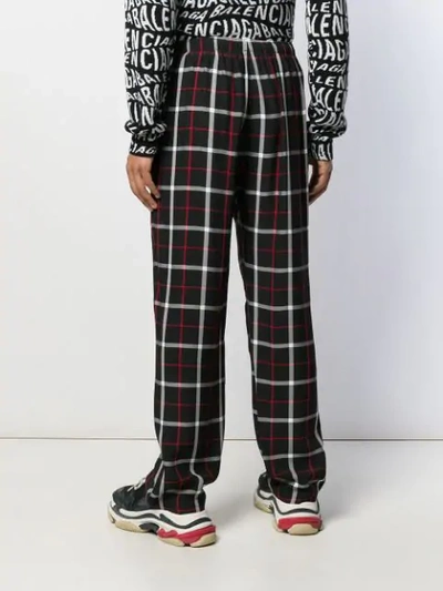 Shop Balenciaga Pajama Style Trousers In Black