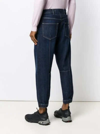 Shop Prada Cropped Baggy Jeans In Blue